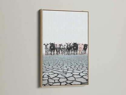 Cattle canvas print in an oak frame. Farm animal print offers a rustic touch to any room. Perfect countryside decor for a dining room or ranch. Discover oak framed artwork.