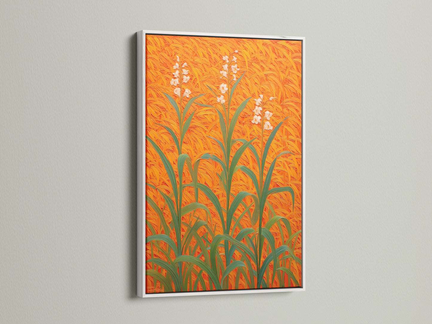 Floral Field Canvas artwork set in a white frame enhancing the botanical print. The orange wall art creates a modern plant artwork piece. Ideal for entryway decor. This floral wall decor brings nature indoors. The field art print on botanical canvas offers a fresh orange home decor idea. It's a stylish plant art print.