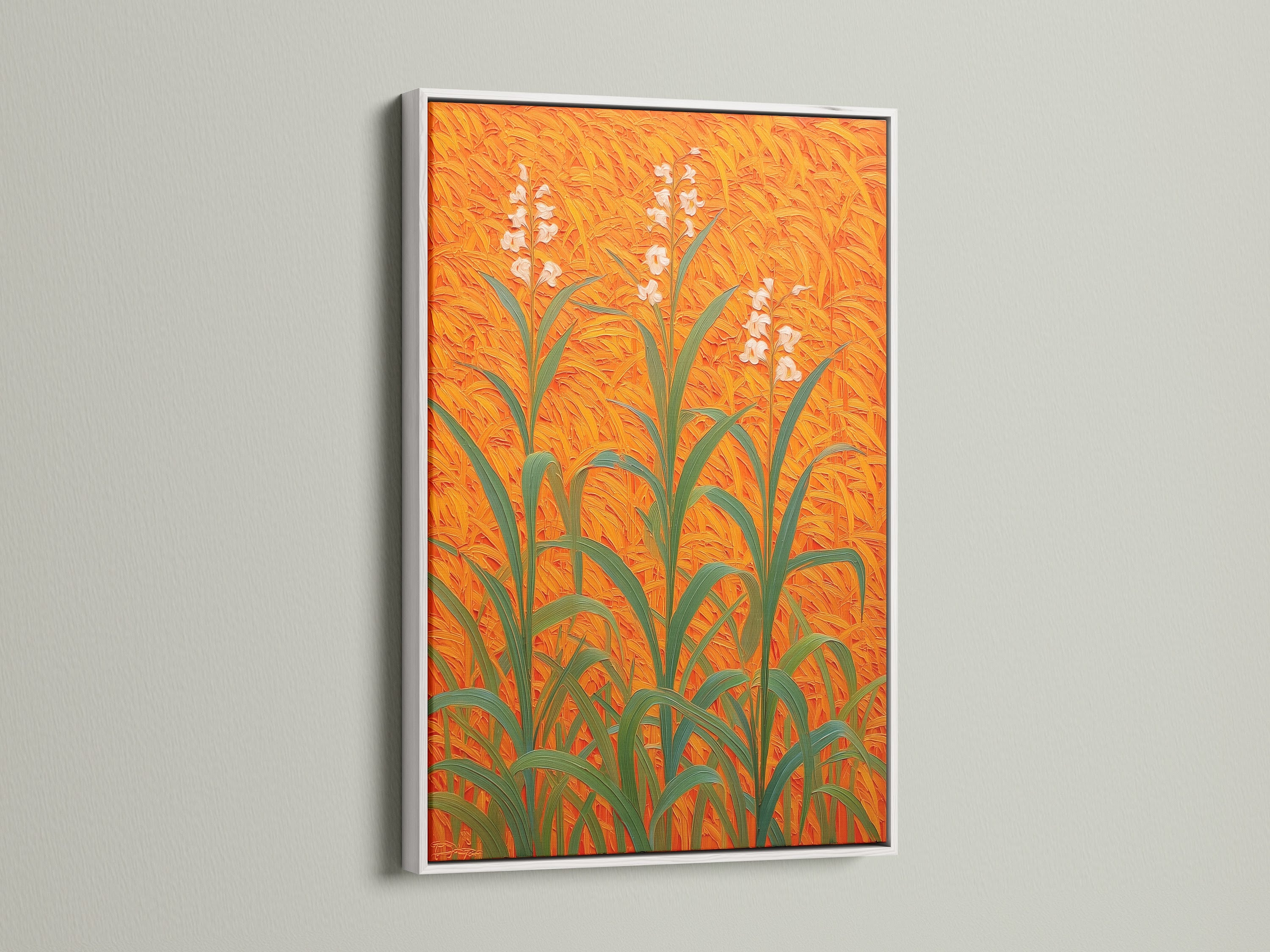 Floral Field Canvas artwork set in a white frame enhancing the botanical print. The orange wall art creates a modern plant artwork piece. Ideal for entryway decor. This floral wall decor brings nature indoors. The field art print on botanical canvas offers a fresh orange home decor idea. It's a stylish plant art print.