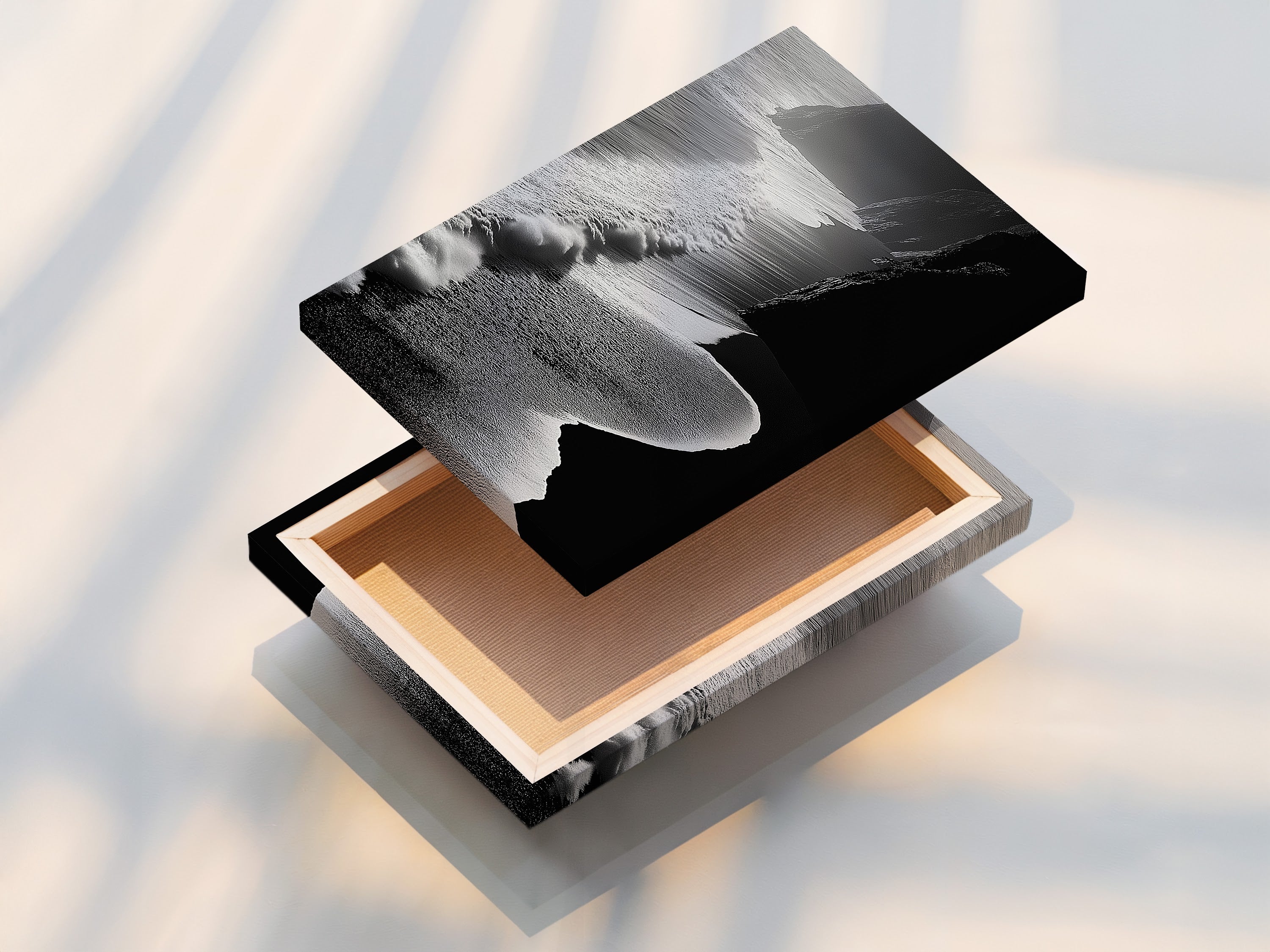 Here is a stretched canvas print of ocean waves. The black and white artwork showcases aerial beach photography. The stretched canvas provides a gallery-worthy look. Perfect for modern coastal decor in living rooms. It is also great for bedrooms and offices. This artwork adds a touch of contemporary elegance to any space. Enhance your home with this stunning piece.