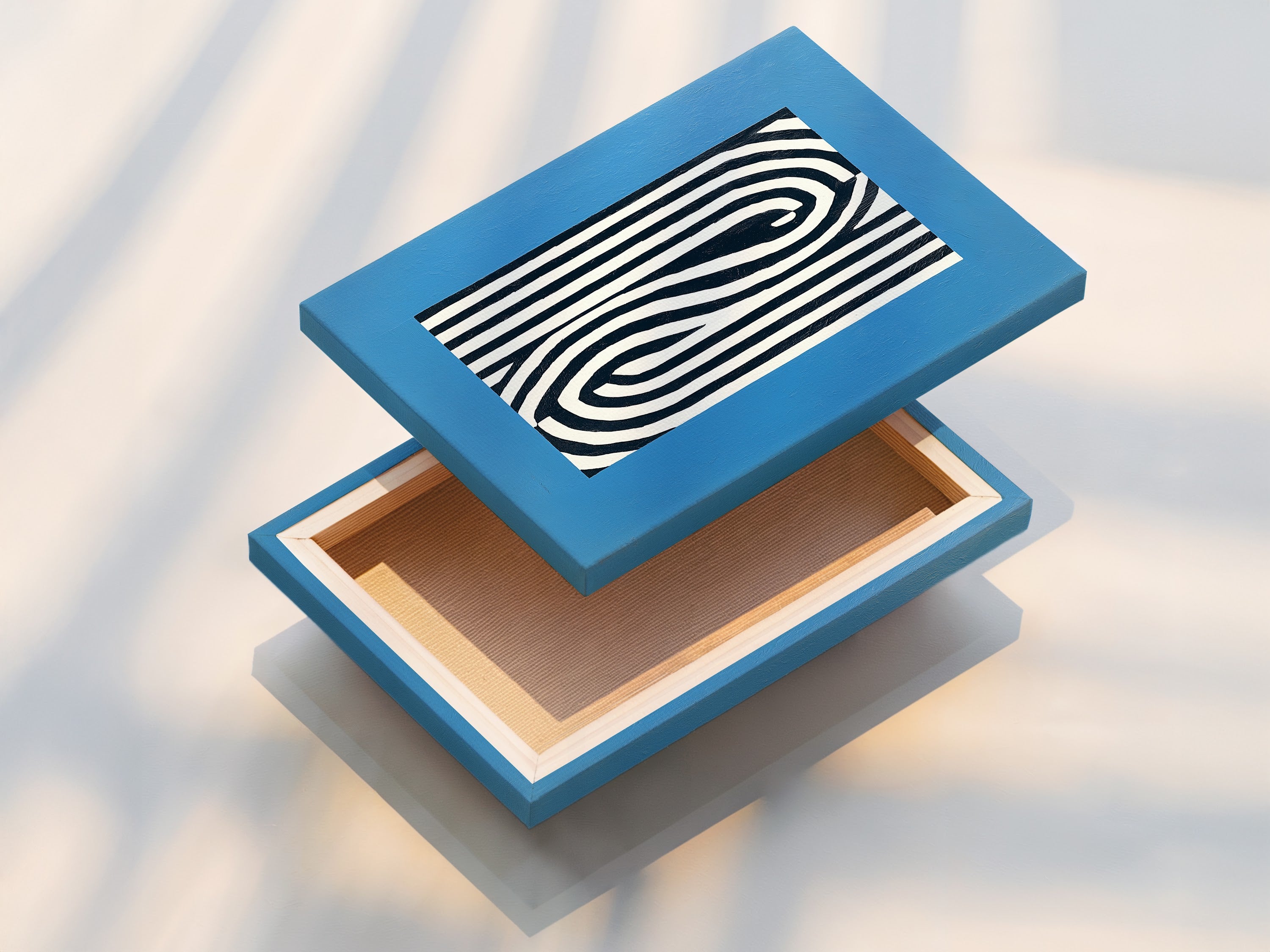 A stretched canvas print featuring abstract line art. The blue modern wall art is ready to hang. This minimalist canvas adds style to any room. Perfect for contemporary homes or offices. View our stretched canvas art prints today.