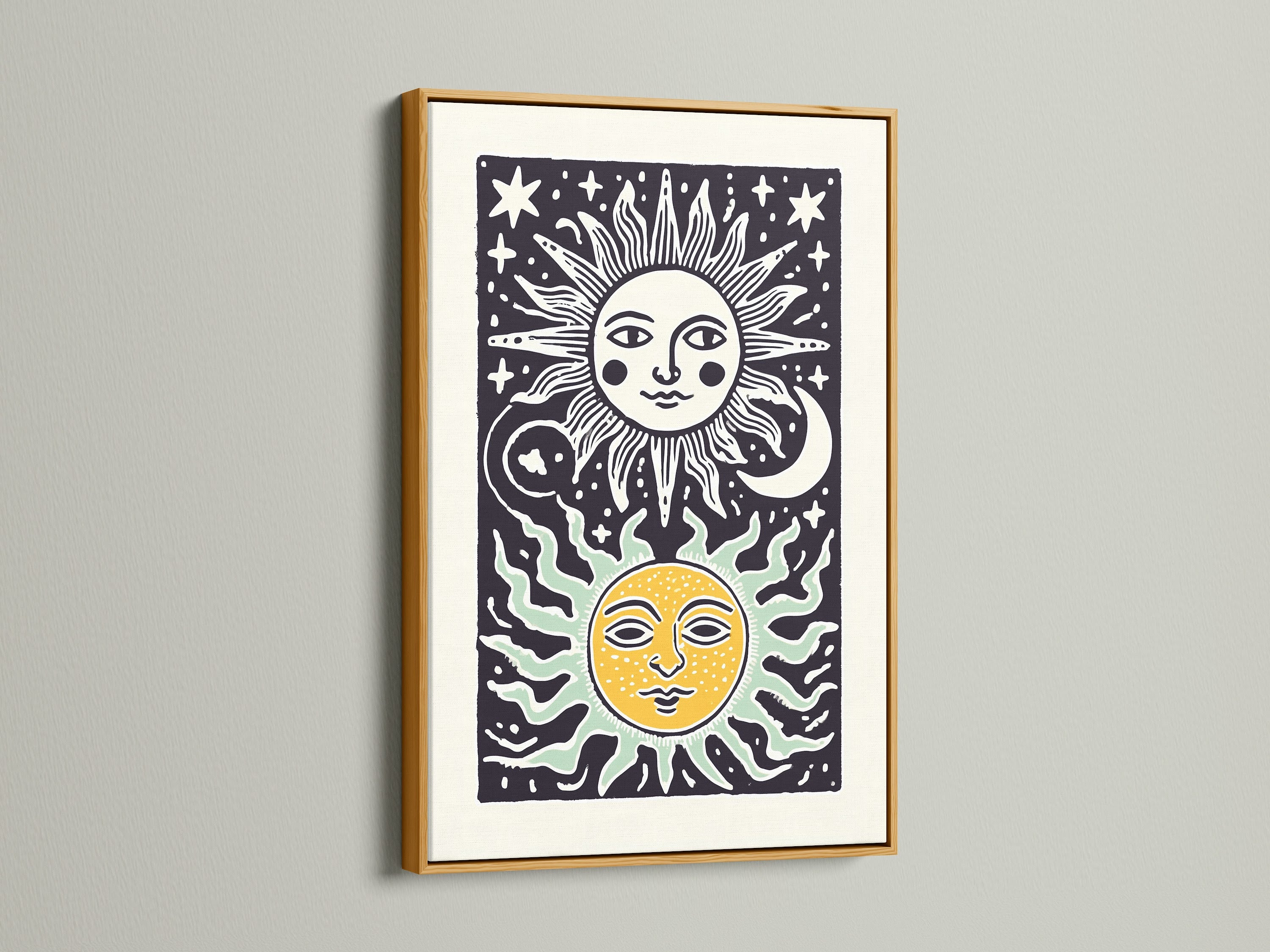 Gold frame enhances sun and moon art. The frame provides a luxurious touch. The artwork is displayed on a white wall. It creates an elegant and sophisticated look. The gold frame complements the artwork. The art is a great addition.