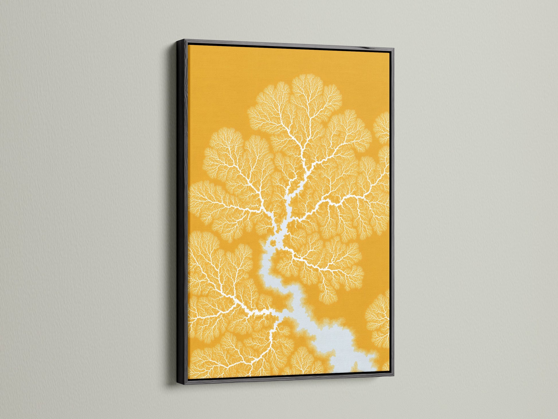 Botanical Fractal Canvas Print with a black frame. This mustard yellow artwork with abstract branch art is perfect for modern home decor. It adds a touch of geometric art and scandi style to any room. The black frame provides a bold and modern look.