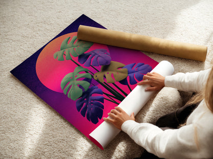 A woman is carefully rolling a fine art poster paper. She is handling a monstera retro sunset print. This high-quality paper ensures the artwork's colors remain vibrant. Perfect for preserving your botanical art.