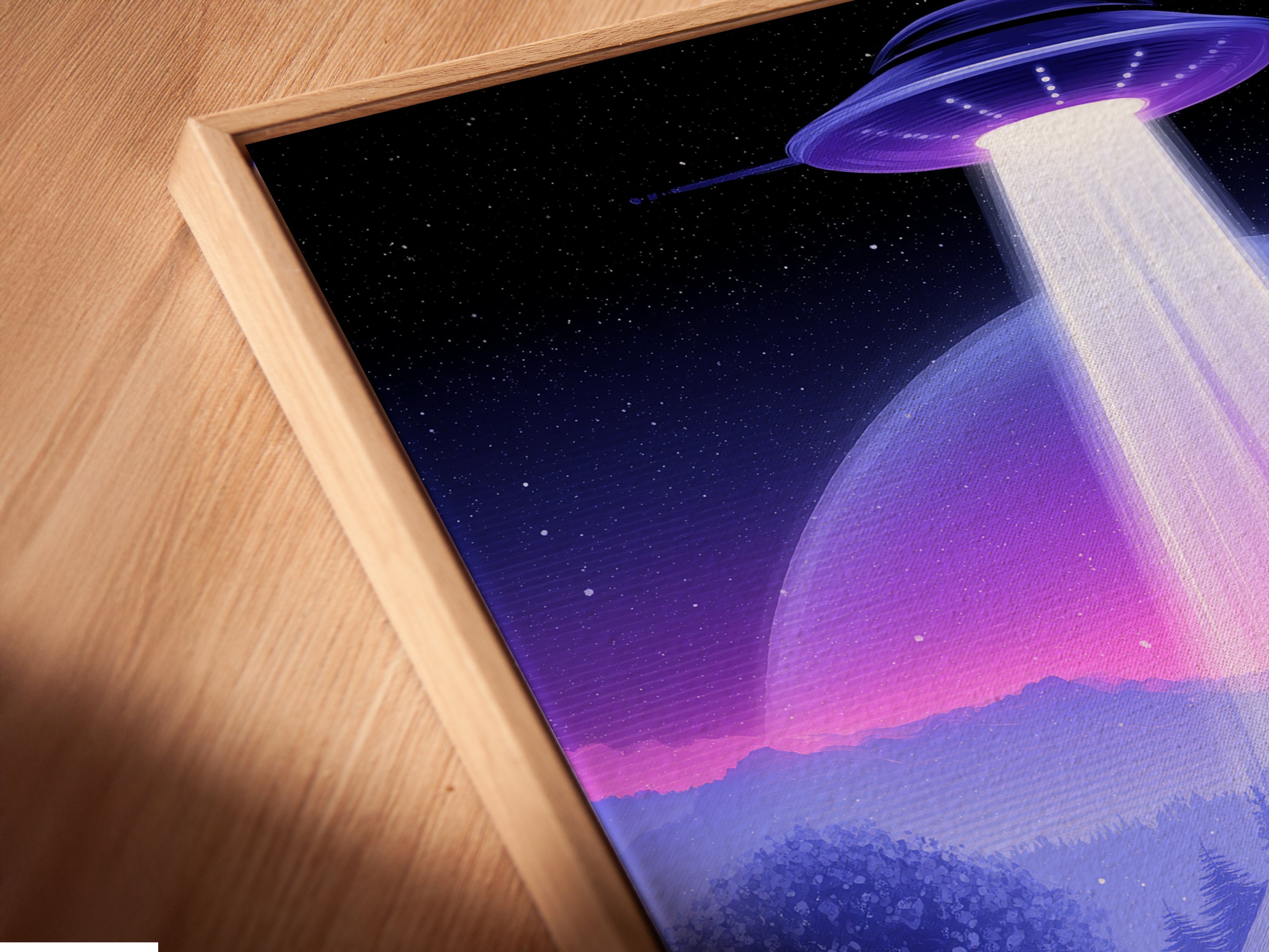 Here is a close-up angled view of a canvas print in a floating frame. The UFO Abduction artwork is showcased. The floating frame enhances the sci-fi landscape. It adds a modern touch to the extraterrestrial art. This cosmic print is perfect for any wall.
