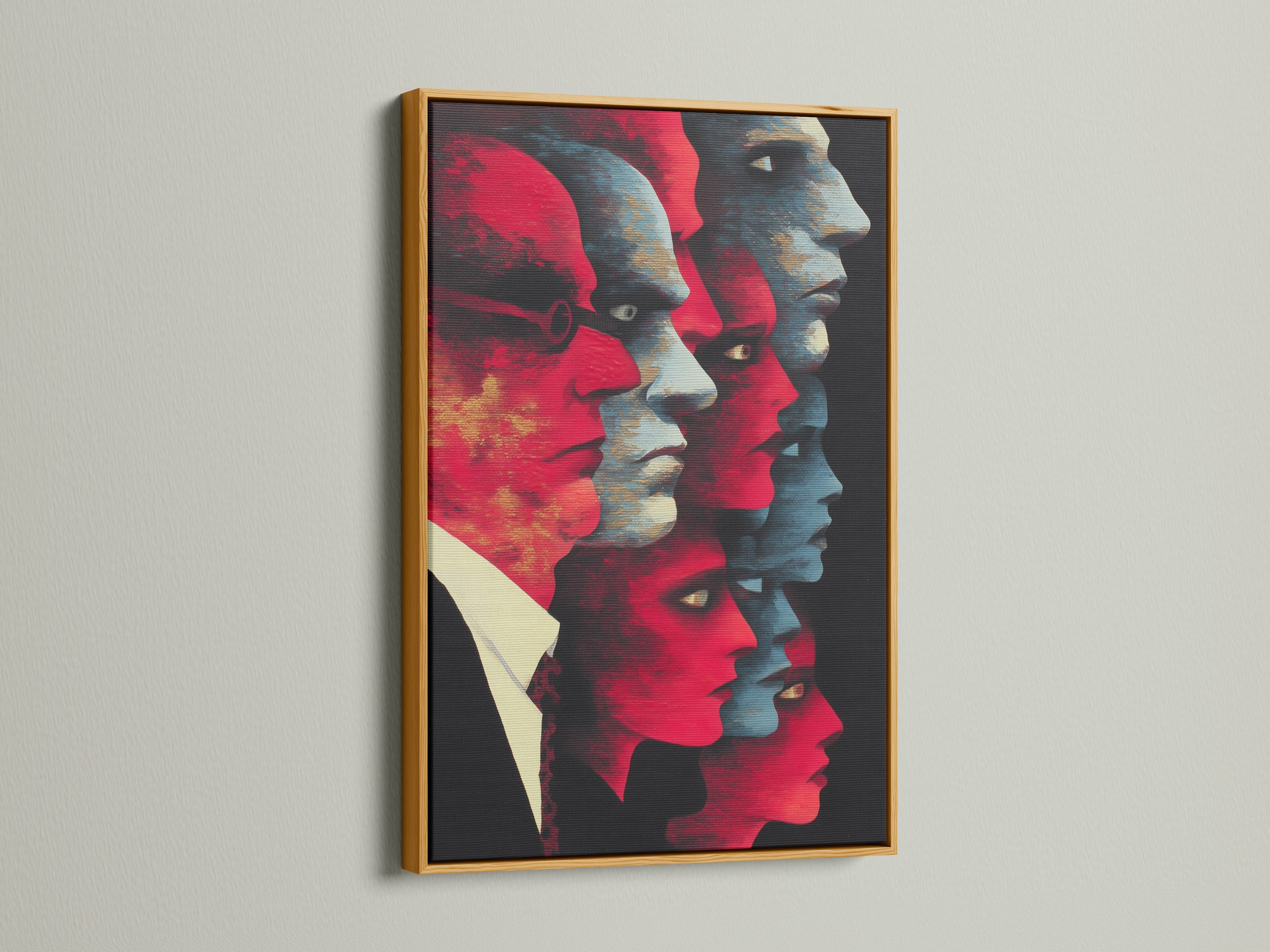 Elevate your space with this abstract faces art in a gold frame. The red and blue modern canvas art makes a statement. Perfect for those seeking unique artwork that stands out. This contemporary print is ideal for a bold art print in any setting. Enhance your office or home decor with this modern portrait.