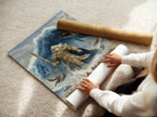 A woman is carefully rolling a fine art poster paper print of a Norse Mythology Wall Artwork. The artwork features Poseidon Sea God. Fine art poster paper ensures high-quality reproduction. Perfect for collectors and art enthusiasts.