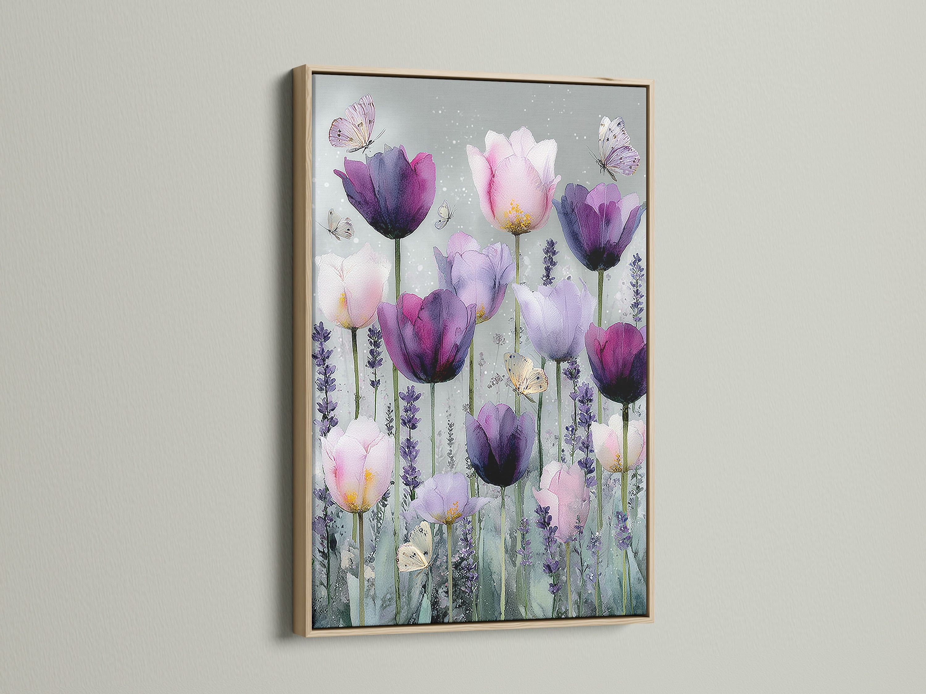 An oak frame surrounds a beautiful artwork. The artwork features vibrant tulips in shades of purple and pink. Delicate butterflies flutter around the flowers creating a serene scene. The oak frame complements the art adding a touch of natural elegance. The art is displayed against a clean wall.