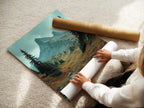A woman is rolling a fine art poster paper. The paper features mountain landscape artwork. This demonstrates the care in packaging nature prints. The artwork showcases an alpine valley. Ideal for those seeking landscape wall art and mountain decor.