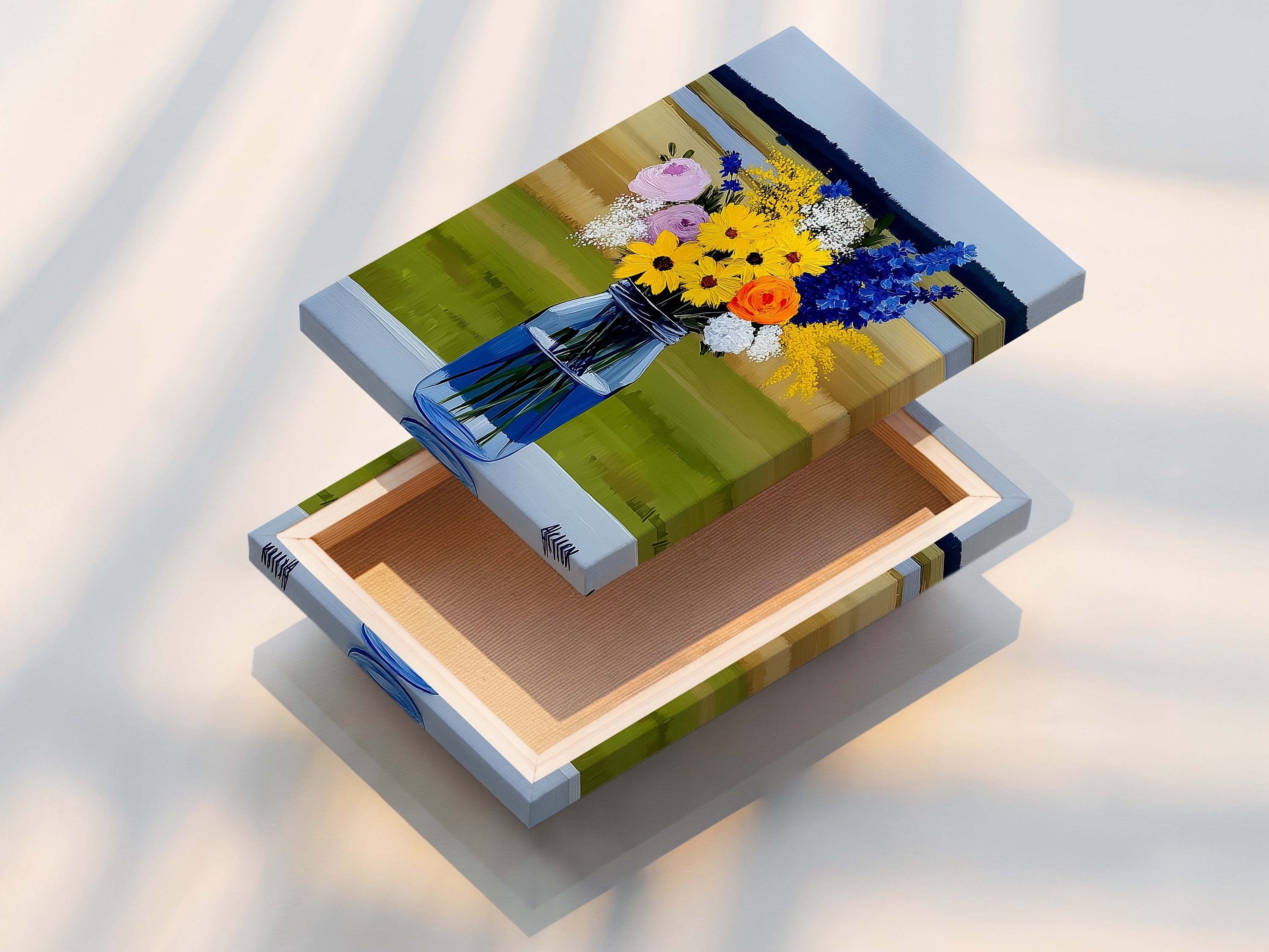 A stretched canvas print showcases a colorful wildflower bouquet. The canvas texture enhances the artwork's depth. It is ready to hang and adds a touch of rustic charm to your home. A perfect flower artwork for any room.