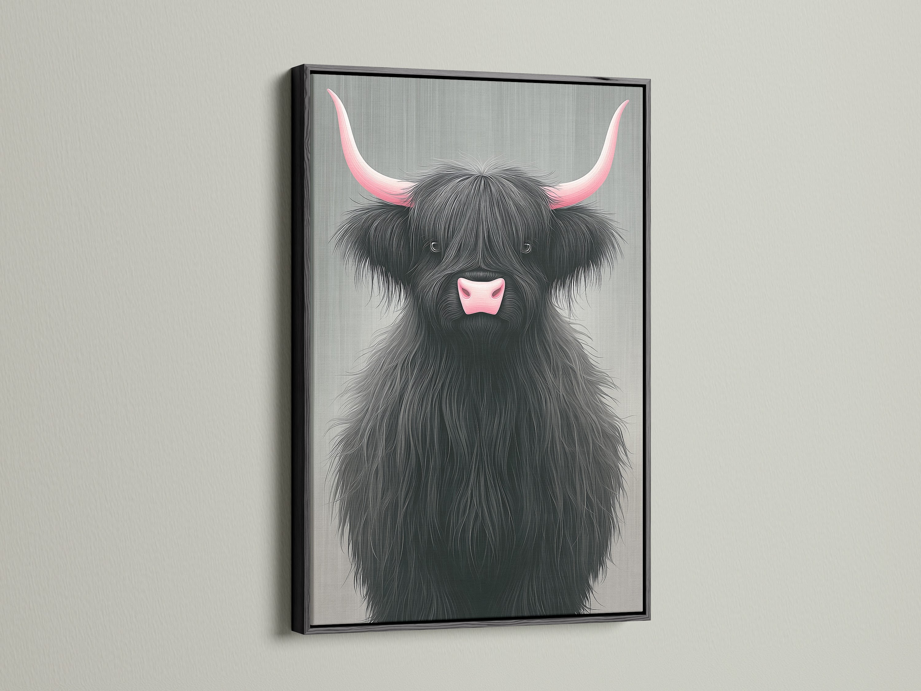Highland Cow canvas print with pink horns in a black frame. This striking animal wall decor adds a contemporary touch to your space. The black frame makes the artwork pop. Ideal for farmhouse or modern interiors. A unique cow artwork.