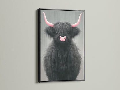 Highland Cow canvas print with pink horns in a black frame. This striking animal wall decor adds a contemporary touch to your space. The black frame makes the artwork pop. Ideal for farmhouse or modern interiors. A unique cow artwork.