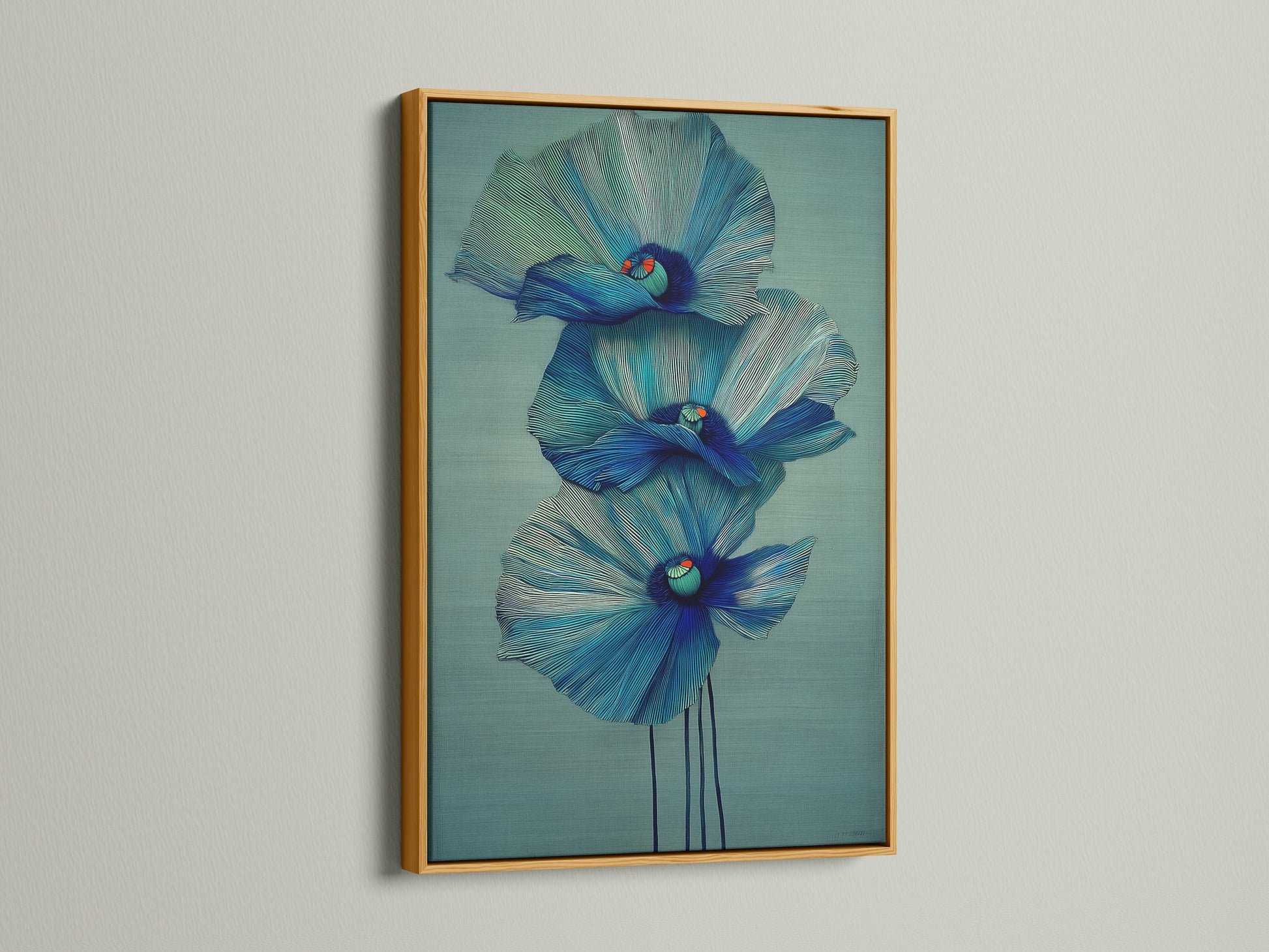 A stunning blue flower artwork is displayed in a gold frame. This floral canvas print adds a touch of luxury to your decor. Browse our selection of modern art prints. Perfect for bedroom wall decor and scandi decor.