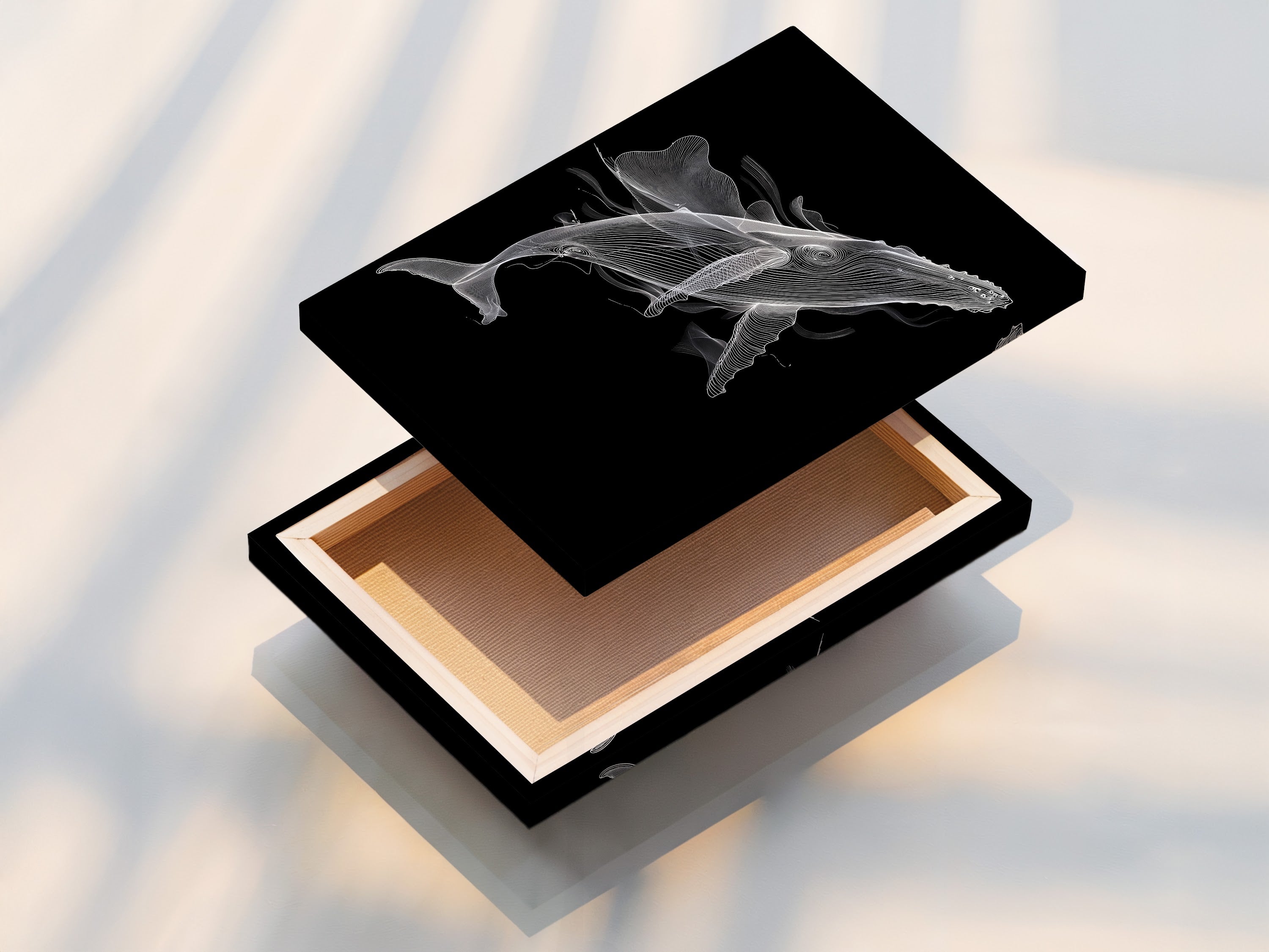 A stretched canvas print showcases a black and white whale artwork. The minimalist ocean canvas print is ready to hang. It's perfect for creating a modern and stylish space. Enhance your bedroom wall decor with this whale canvas print. This is a stunning piece of marine animal art.