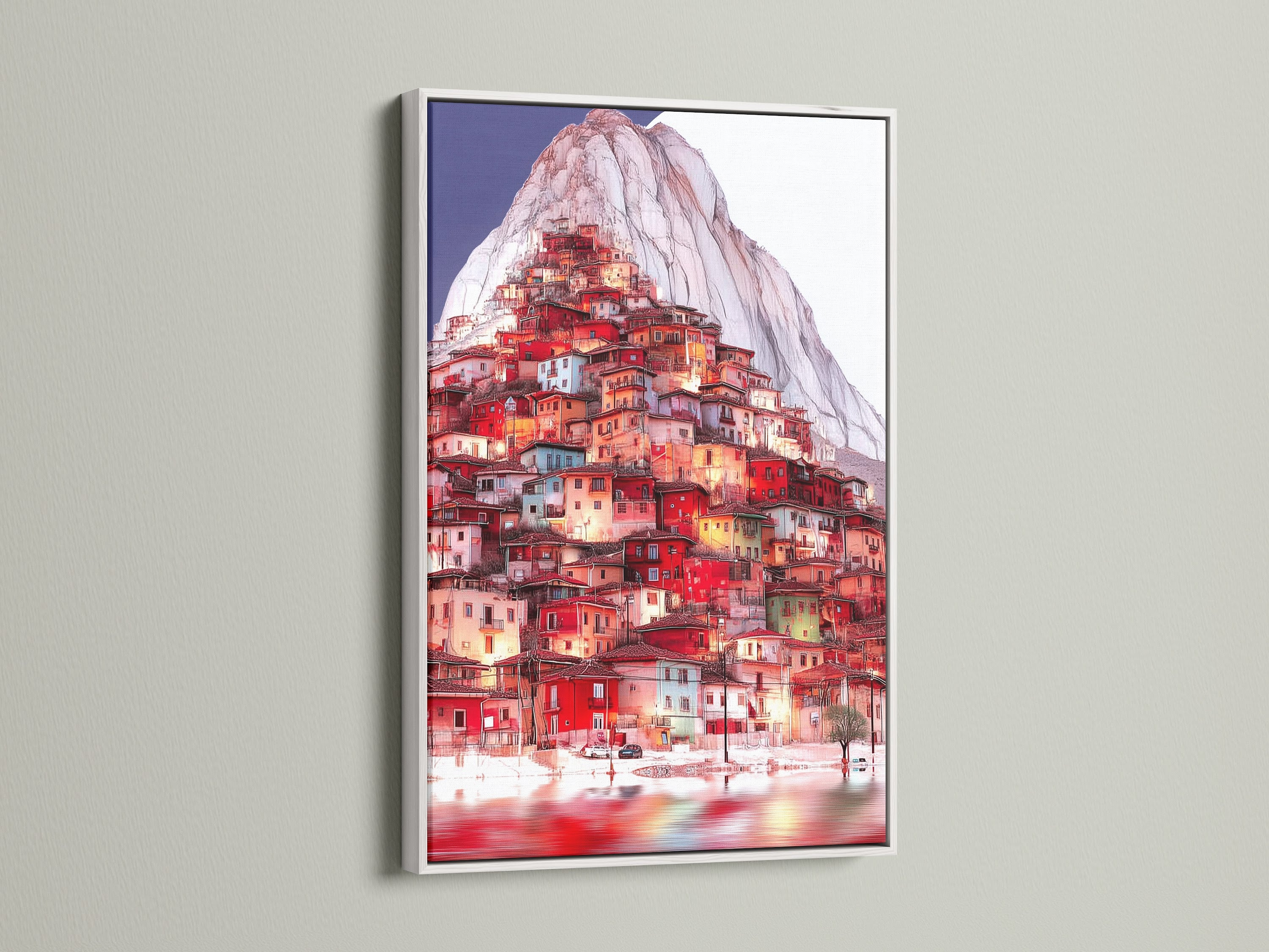 The Mountain Village artwork is showcased in a white frame. A clean modern look for this scenic wall art. The white frame allows the village art's colors to pop. Ideal for any room.