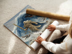 A woman is carefully rolling a fine art poster paper print of an epic fantasy battle scene. The artwork depicts an ancient warrior confronting a monstrous sea creature. This high-quality poster paper ensures the colors and details of the artwork are vividly displayed. It's ideal for any fantasy art lover.