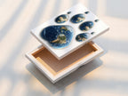 Stretched canvas print on display. The artwork is taut and ready to hang. The art shows a paw print made of Earths. The stretched canvas provides a gallery-quality presentation. This print is perfect for adding a touch of sophistication to any room. The wrapped edges offer a clean and modern look.