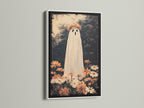 A modern white frame showcases a whimsical ghost artwork. The artwork features a ghost with flowers creating a playful contrast. The white frame offers a clean and contemporary look. Ideal for brightening up any space with a touch of spooky art. This frame highlights the artwork's unique charm.