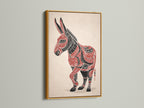 A gold frame surrounds the Tribal Donkey art print. The gold enhances the ethnic wall art. The animal artwork is a focal point. The folk art print's red and black geometric animal is captivating. This tribal decor piece adds elegance. Southwestern art is a sophisticated choice.