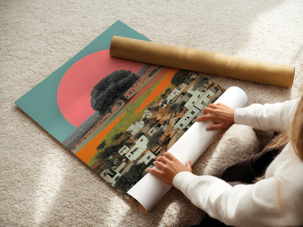 A woman delicately handles a fine art poster paper featuring the Indian Village artwork. This image highlights the care and quality of the print. Ideal for homeowners renters and interior decorators seeking unique global art.