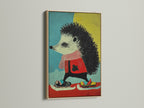 Hedgehog art displayed in an oak frame. This animal wall art adds a touch of whimsy to any space. Ideal nursery decor or kids room art. The colorful animal print will brighten up any room. A cute and contemporary piece.