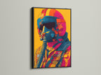 Artwork in a black frame hangs on a white wall. The art features a pilot with a helmet and mask. The black frame adds a bold and sophisticated touch. This is a striking piece for any room.