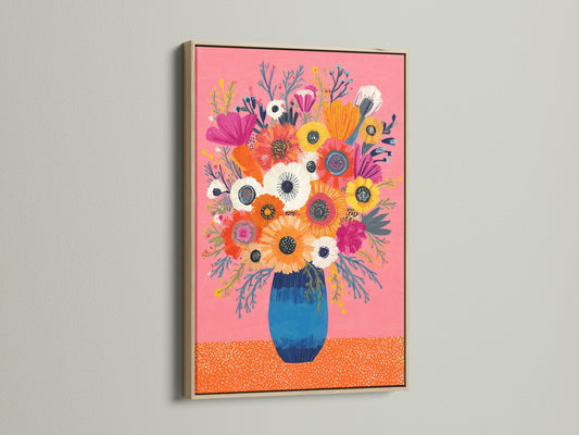 Oak frame showcases a vibrant floral artwork. The artwork features a pink backdrop and a blue vase. The oak frame adds a touch of warmth to the piece. This artwork enhances the beauty of the floral art. Shop now to bring a touch of nature indoors.