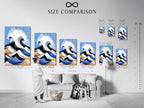 Size comparison chart in an interior setting. Visualize how the ocean wave artwork fits. The abstract seascape comes in various sizes. The blue and orange coastal wall decor enhances any room.
