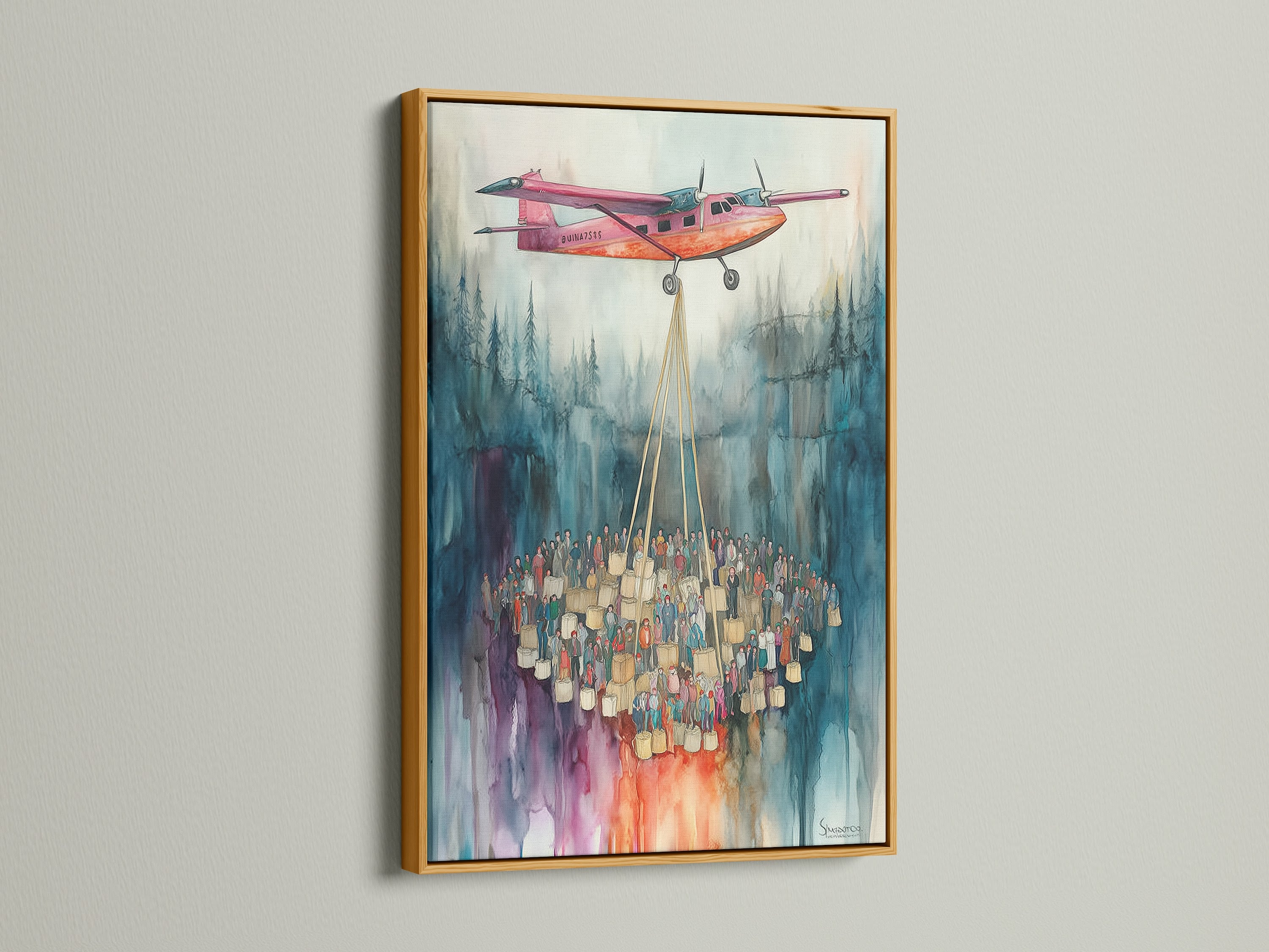 A watercolor airplane artwork in a gold frame. The artwork hangs on a wall. It features a pink airplane and a crowd of people. The travel themed artwork is perfect for homeowners and renters. It's a unique find for interior designers.