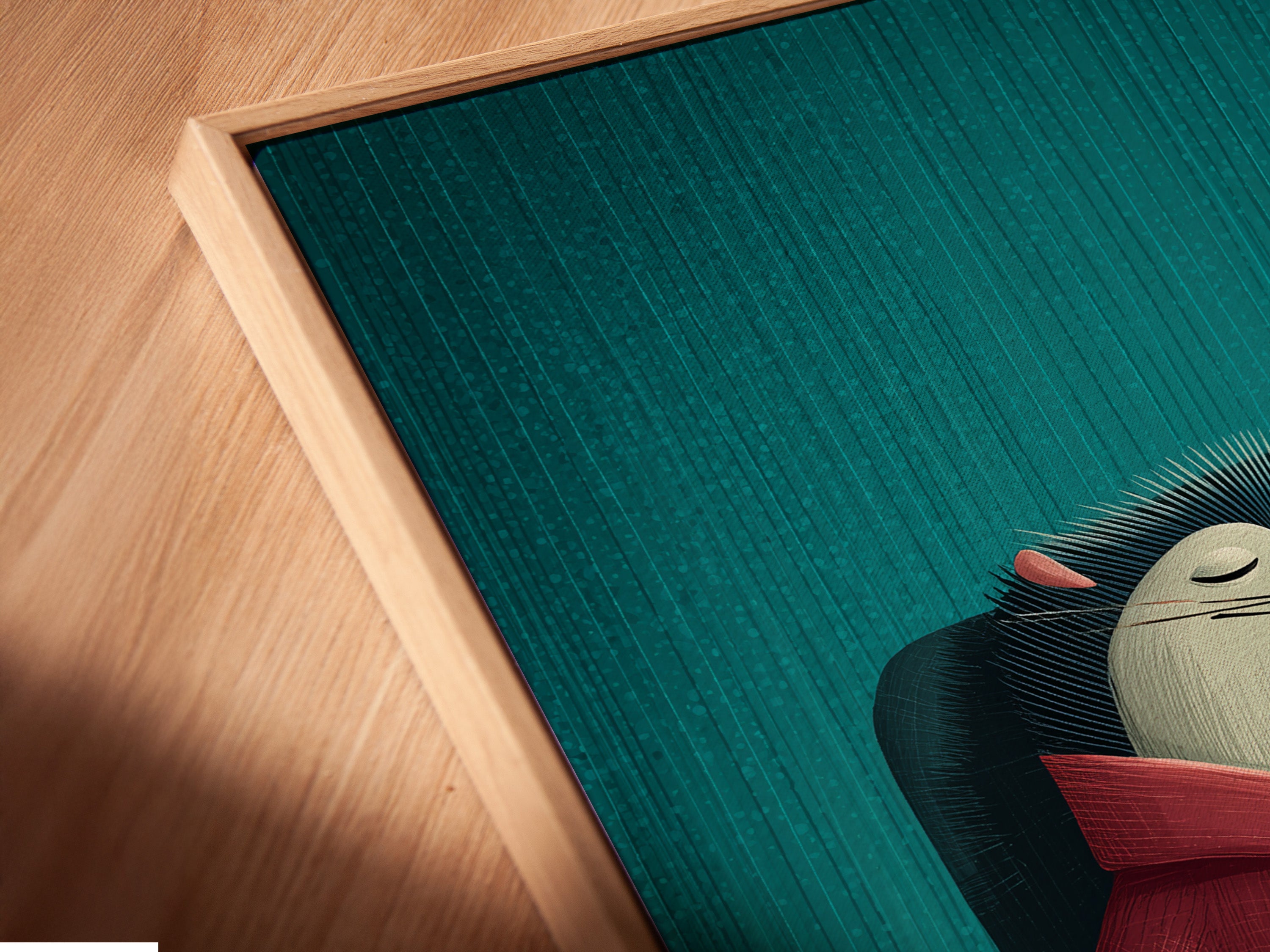 A close up angled view of the Reading Hedgehog canvas print in a floating frame. The floating frame adds depth and dimension to the artwork. This contemporary style art is great for any room. It's ready to hang and enjoy. Perfect for renters and homeowners.