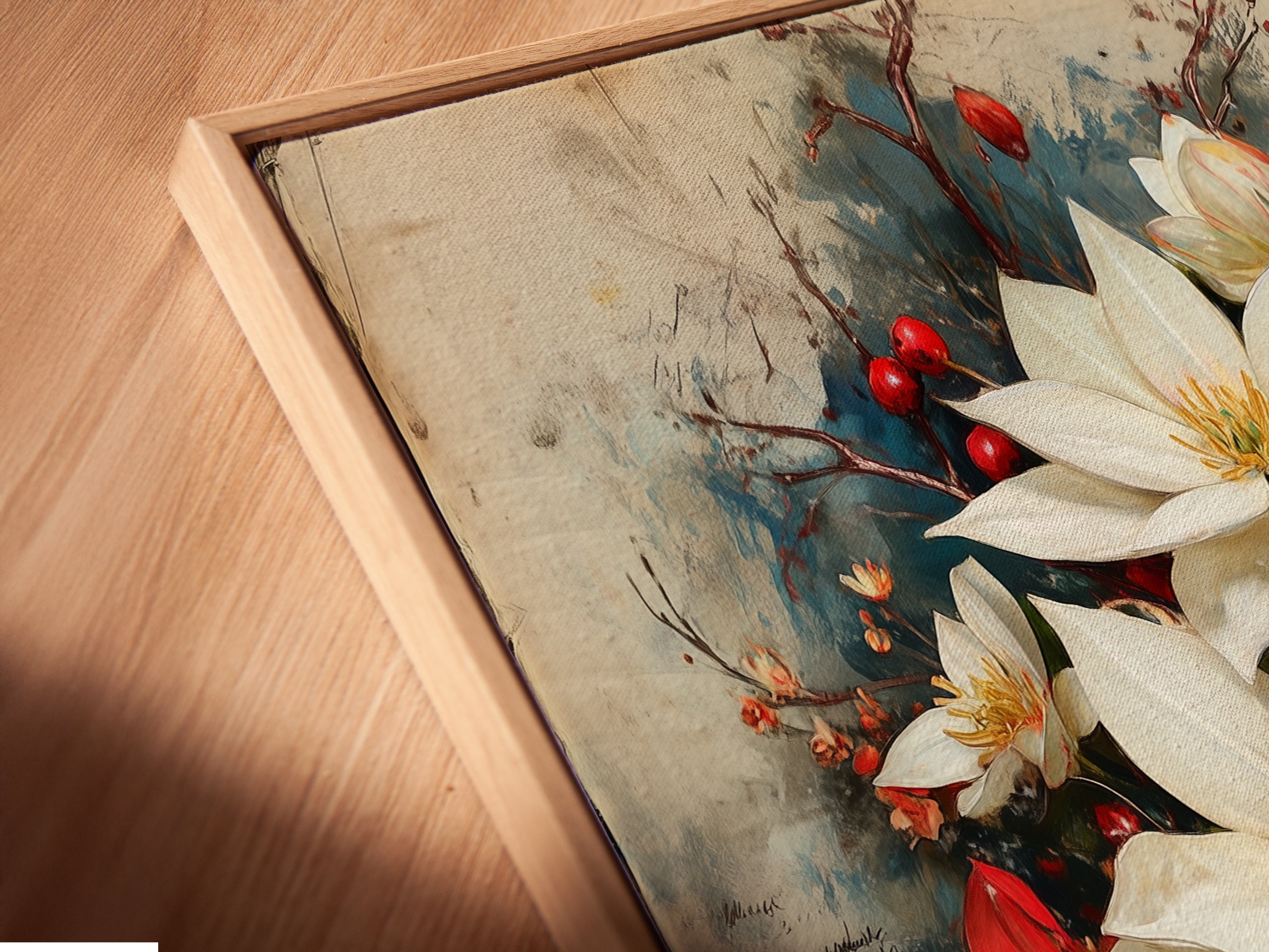 Close up angled view of a poinsettia canvas print in a floating frame. The flower artwork enhances any space. This vintage print adds charm. Elevate your holiday decor with this botanical print. Perfect for dining room art or as a Christmas gift.