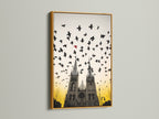 Gothic Cathedral artwork with birds in flight. The frame is gold. The gold frame adds a touch of luxury. Enhance your living space with this art. A vintage cathedral print is a great conversation starter. The artwork is perfect for architecture enthusiasts.