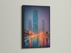 See a cityscape canvas art print displayed in a black frame. This urban canvas art makes a bold statement. The night city decor adds sophistication. It's suitable for studios and clinics. Appreciate the modern office art.