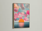 This is a close up of the Sunset Clouds artwork. The artwork is displayed with an oak frame. The print captures a serene ocean view with pink clouds. The horizon print adds a calming touch. Enhance your home with this beautiful seascape canvas.