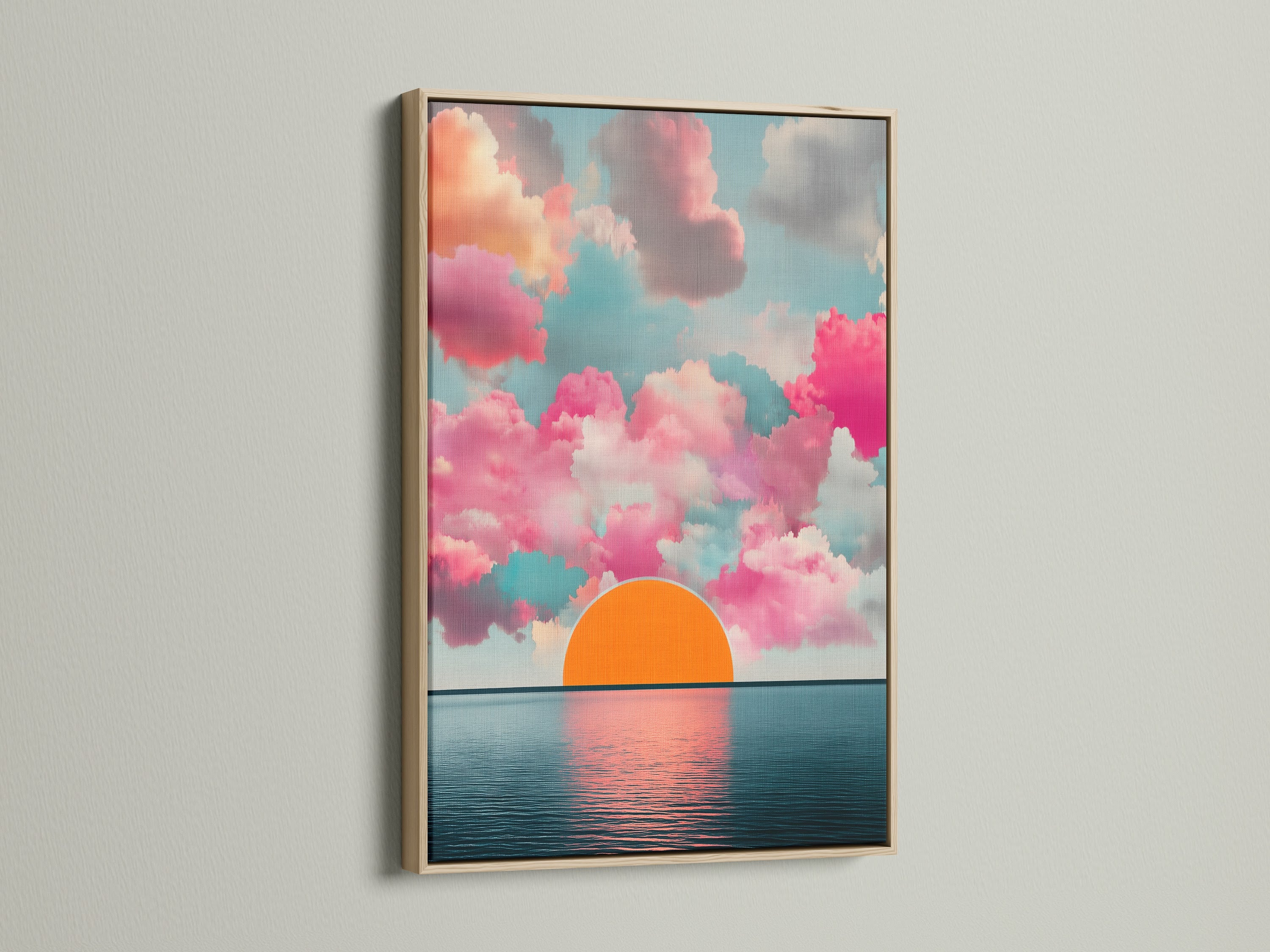 This is a close up of the Sunset Clouds artwork. The artwork is displayed with an oak frame. The print captures a serene ocean view with pink clouds. The horizon print adds a calming touch. Enhance your home with this beautiful seascape canvas.