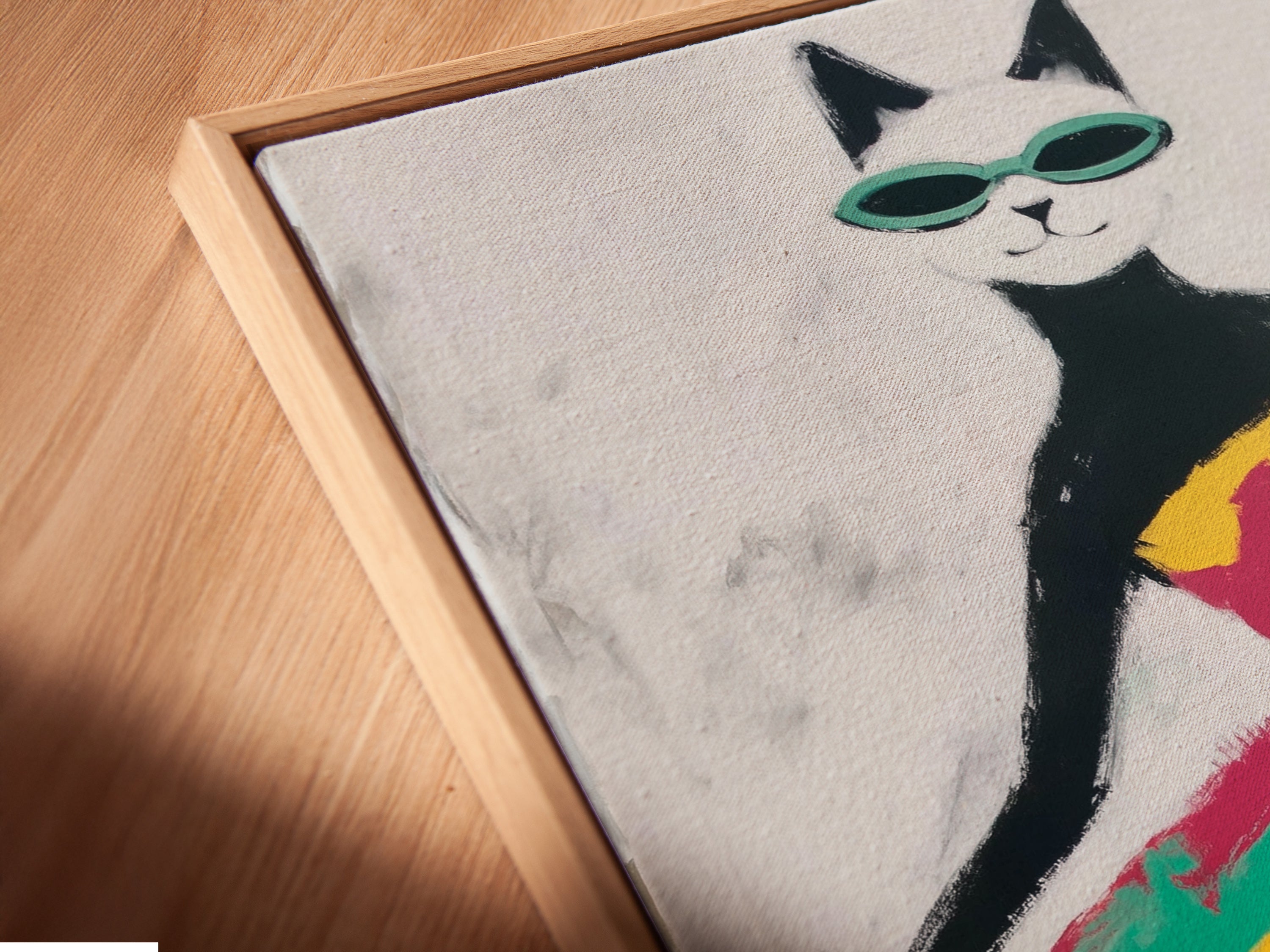 A close-up angled view shows the canvas print. It is set in a floating frame. The Cool Cat Art Print looks stunning. The colorful abstract animal canvas adds depth. This playful wall art is a unique decor choice. Its modern cat canvas style is eye-catching.