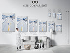A size comparison chart is displayed in an interior setting. It helps visualize the Winter Cityscape artwork in different sizes. Find the perfect fit for your space. This cool-toned minimalist art enhances living rooms bedrooms offices and more. Choose the right size for your wall.