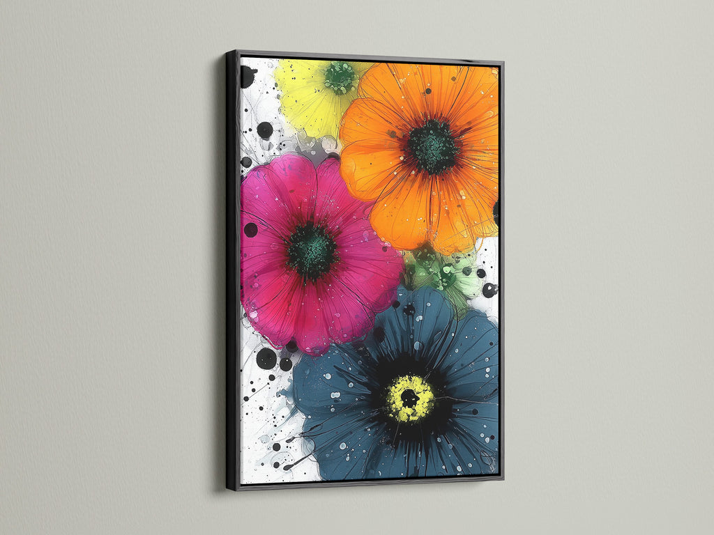 Vibrant flower artwork in a black frame. This colorful botanical wall art features orange pink and blue flowers. The artwork complements minimalist Scandinavian or eclectic interiors. Perfect for bedroom art or living room wall decor. The black frame creates a bold contrast.