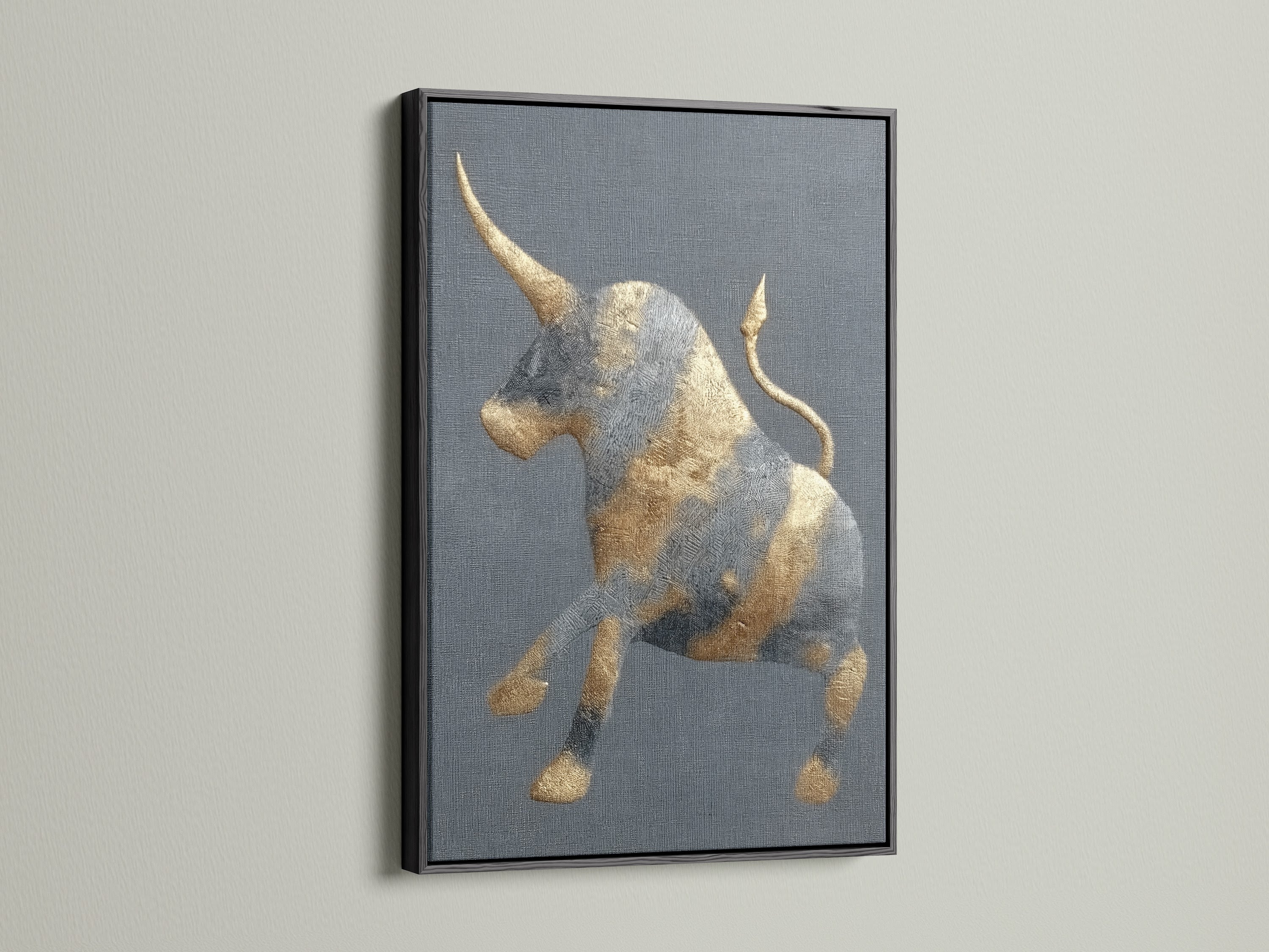The golden bull artwork with a black frame is displayed. This modern art print offers a bold statement. The animal canvas suits rustic or industrial decor. It's ideal for masculine spaces like offices. The minimalist art complements various interior styles. Add a touch of elegance to your walls.