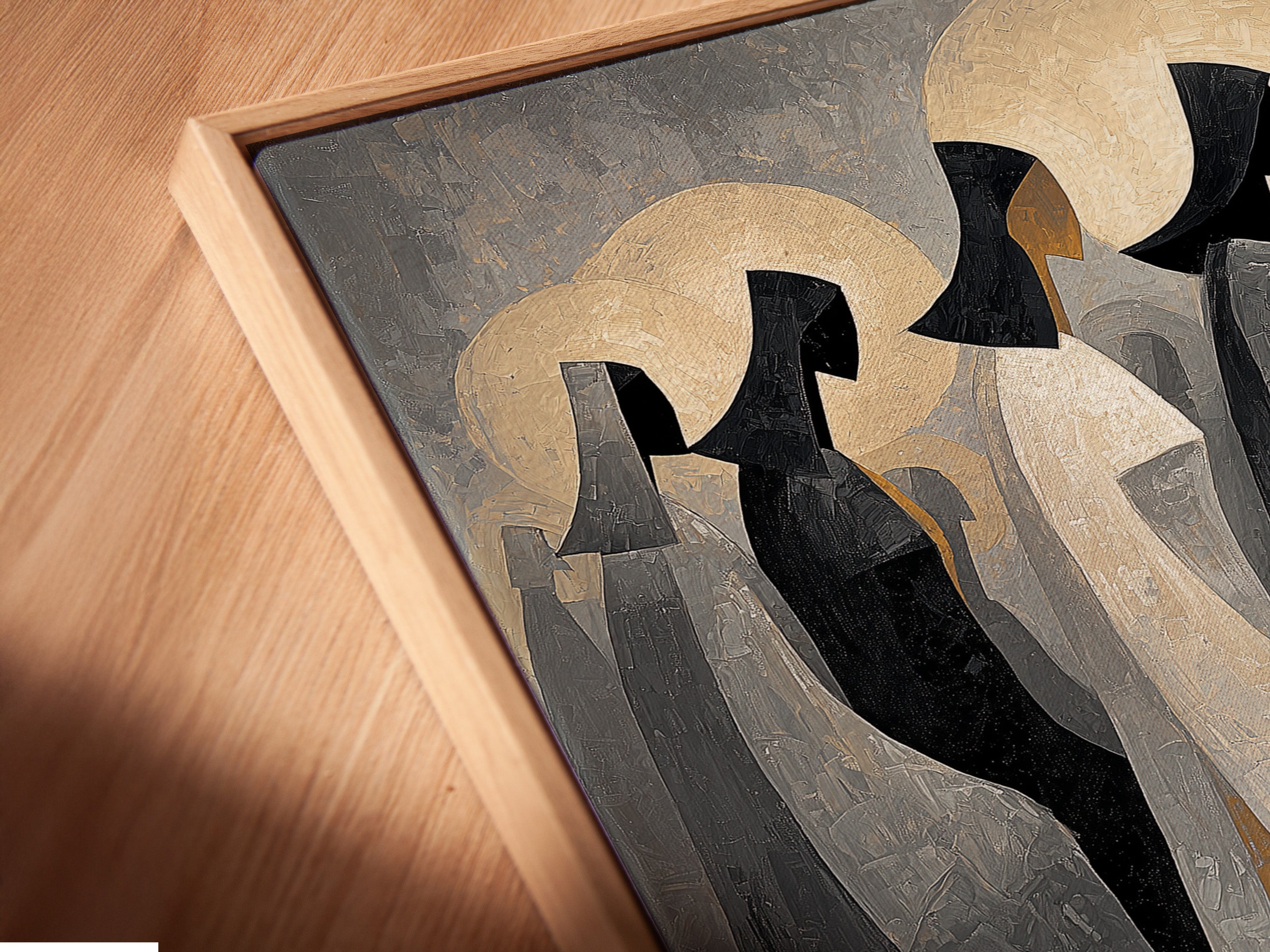 Close-up angled view of an abstract hooded figures canvas print. The artwork is displayed in a floating frame. The contemporary art piece adds a touch of sophistication. Perfect for any room.