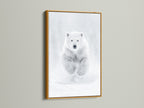 The polar bear artwork is framed in a gold frame adding a touch of elegance to the arctic animal print. The gold frame enhances the bear artwork making it a sophisticated choice for contemporary interiors. It's perfect as wildlife decor.