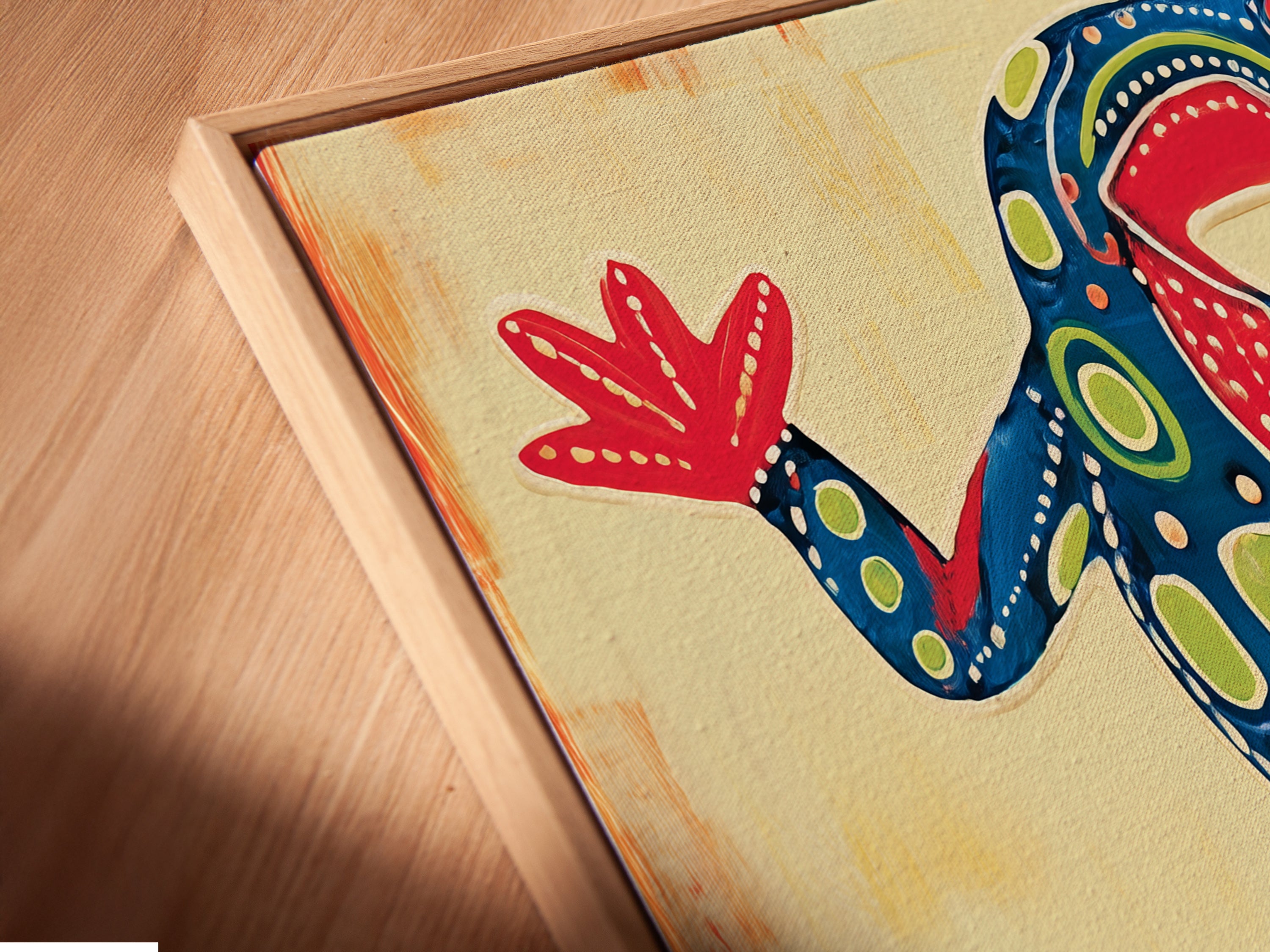 A close-up angled view shows the canvas print in a floating frame. The floating frame adds a modern touch. The lizard artwork appears to float within the frame. This presentation enhances the colorful reptile wall art. It is perfect for any space.