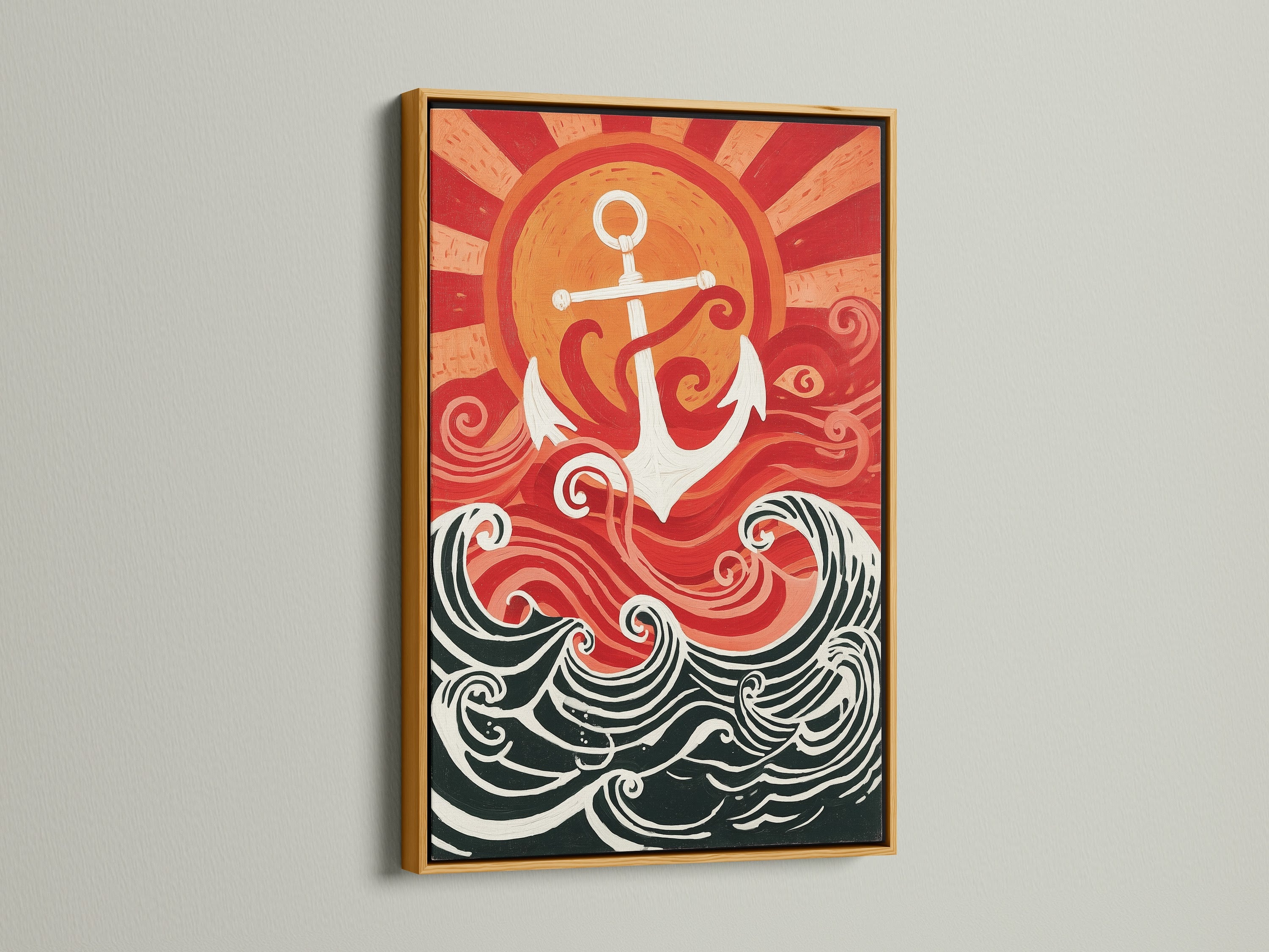 A nautical print with a gold frame. The artwork features an anchor and ocean waves. The colors are red white and black. Enhance your decor with this coastal wall art. Bring a vintage maritime feel to your home. This sea themed decor is great for beach houses. It is a perfect gift for sea lovers.