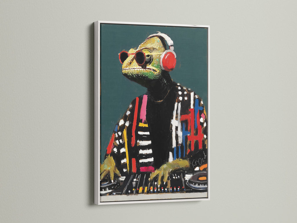 DJ Iguana artwork in a white frame. The white frame highlights the contemporary art style. Perfect for office wall art or dorm decor. This animal DJ print is a fun and unique addition.  