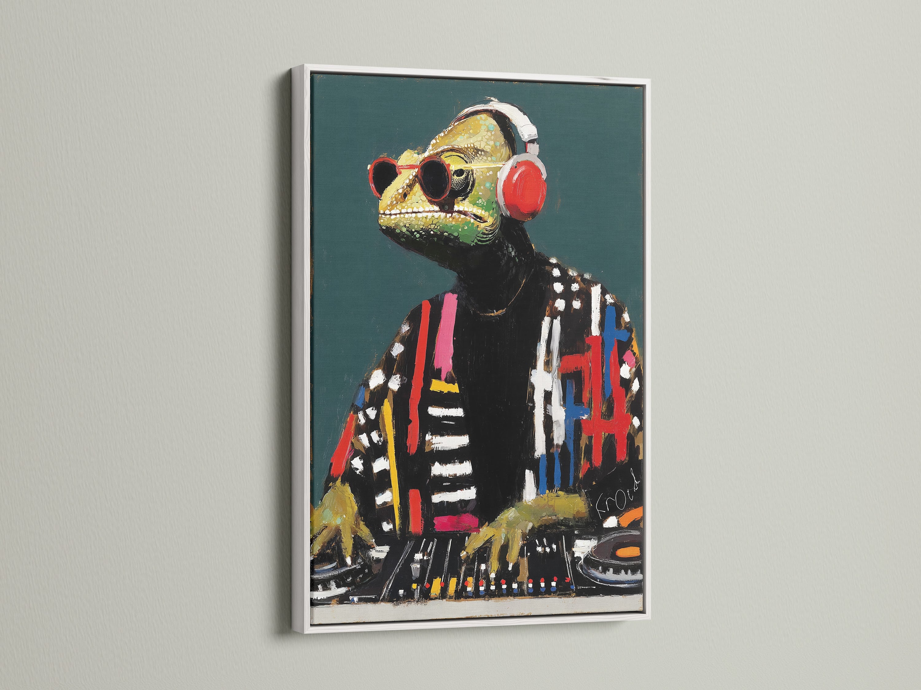 DJ Iguana artwork in a white frame. The white frame highlights the contemporary art style. Perfect for office wall art or dorm decor. This animal DJ print is a fun and unique addition.  