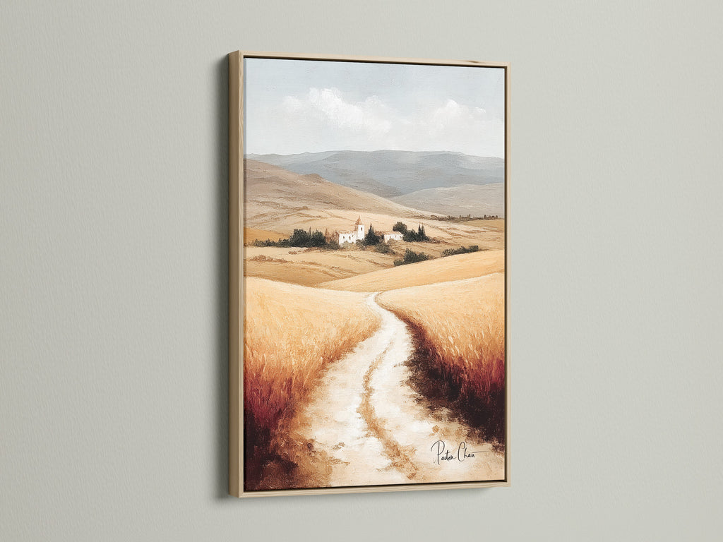 Tuscan Landscape artwork with an oak frame. This Italy art print brings countryside charm to your home. Neutral tone art creates a calming atmosphere. Ideal for farmhouse decor this Italian scenery captures the essence of a wheat field. Add rustic wall art to your dining room.