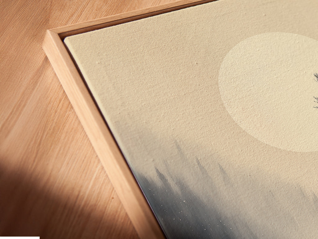 An angled close up showcases a canvas print in a floating frame. The crane Japanese ink wash wall art is beautifully displayed. This winter forest artwork adds depth and dimension to your walls. Perfect for adding a touch of zen to your living space. This art is ideal for modern interiors.