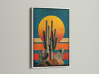 Brighten your interior with this white frame. This cactus canvas print adds a fresh touch. It is perfect for boho and Southwestern spaces. The artwork is a great addition to home offices and creative studios. It is available now.