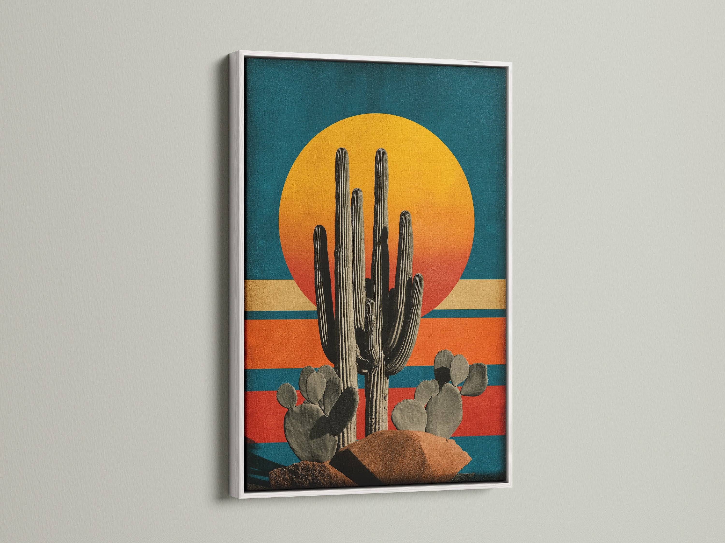 Brighten your interior with this white frame. This cactus canvas print adds a fresh touch. It is perfect for boho and Southwestern spaces. The artwork is a great addition to home offices and creative studios. It is available now.
