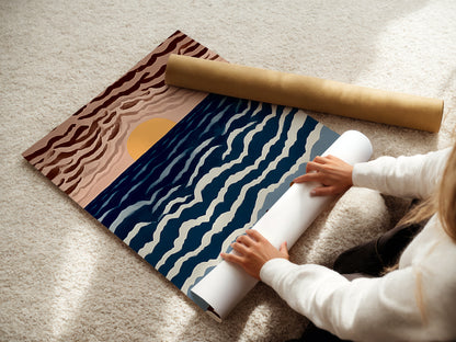 A woman is carefully rolling our fine art poster paper. The paper features the seaside cafe artwork. This shows the care we take in preparing your coastal art. It will be perfect for your space.